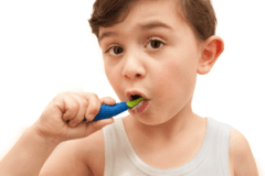 young boy doing toothbrush - Kids Dental Specialists - Children's Toothpaste