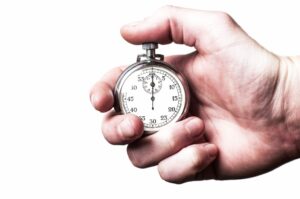 hand with stopwatch